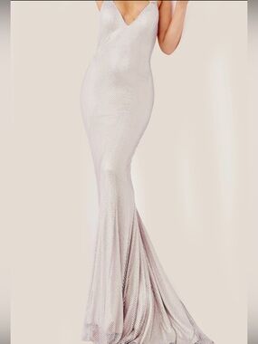 Jovani 08139 prom dress WHITE size 10!! very rare! Hard to find!!
No alterations